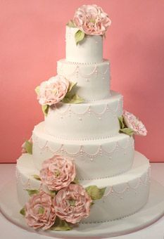 More Floral Wedding Cakes  Created for a wedding with an English Garden theme, this five-tier cake was the centerpiece at an