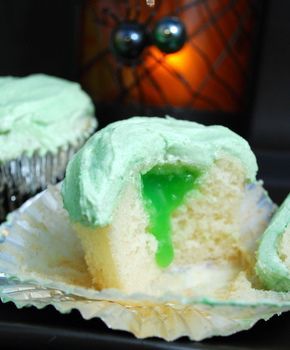 Slime-filled cupcakes (Baking Bites); I made for Hs Mad Science party and filled with lemon curd tinted green. Yum!