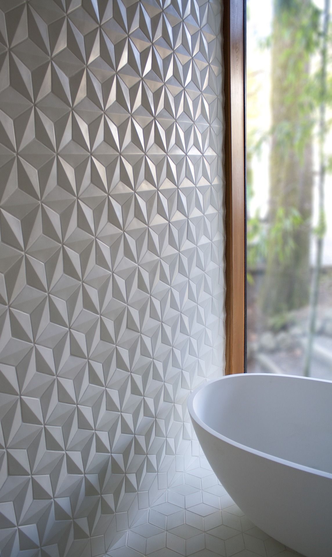 Textured bathroom tiles can create an incredible effect in the bathroom like it has in this one.