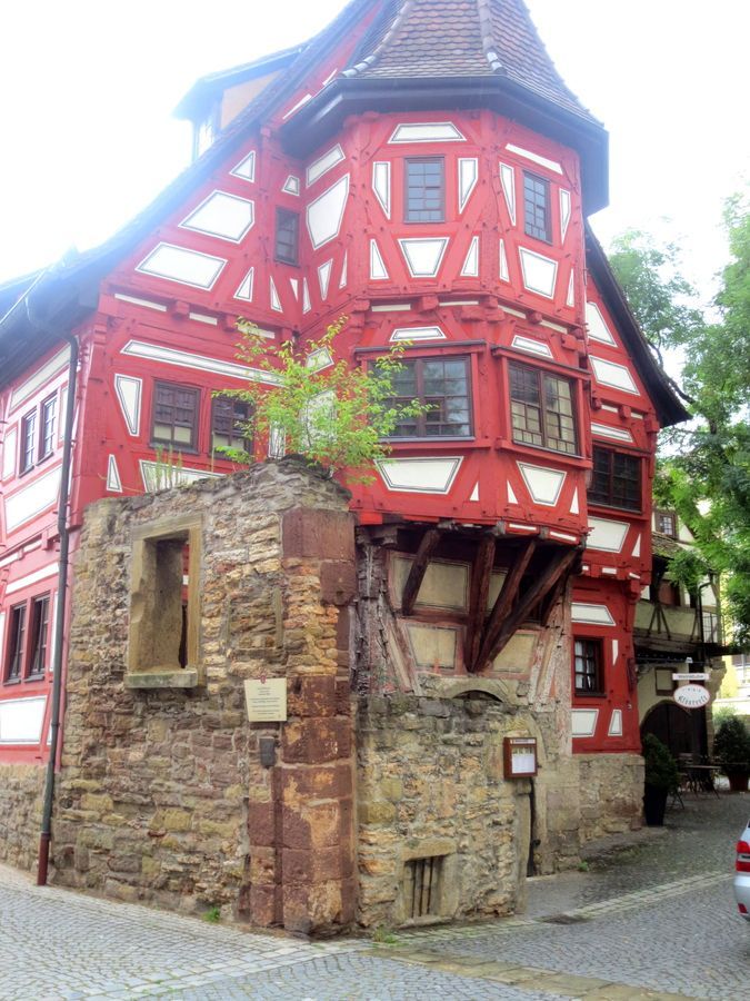 The oldest house in Stuttgart, Germany. It looks like a corner of medieval structure still stands.