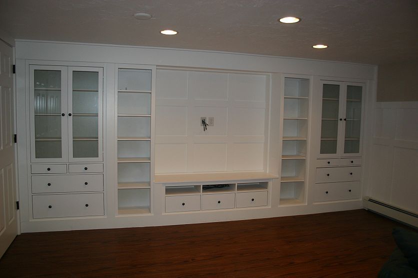 This is amazing! Built-in made from Ikea furniture! Looks fabulous!! I want this in my basement!