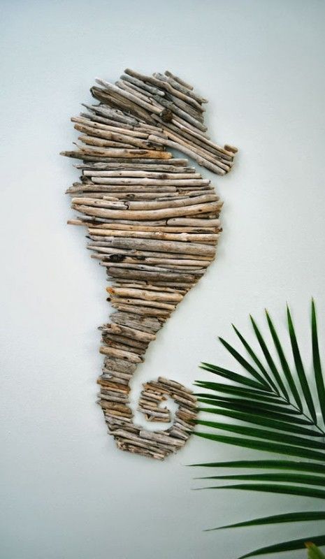This would be cool.  Not the seahorse, haha, but putting sticks together to make a mural.