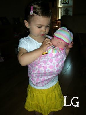 A doll sling just like Mommy’s!  I made one for my 2-year-old granddaughter.  It was so easy!