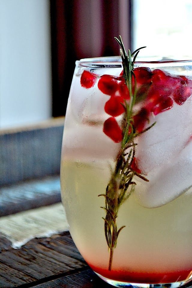 A splash of color makes this Pomegranate and Rosemary White Sangria perfect for the holidays.