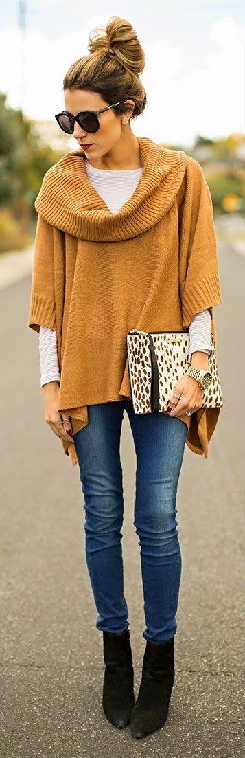 Amazing Shapeless Mustard Color Sweater with Blue Jeans, Black Suede Boots, Leopard Clutch Bag and Accessories
