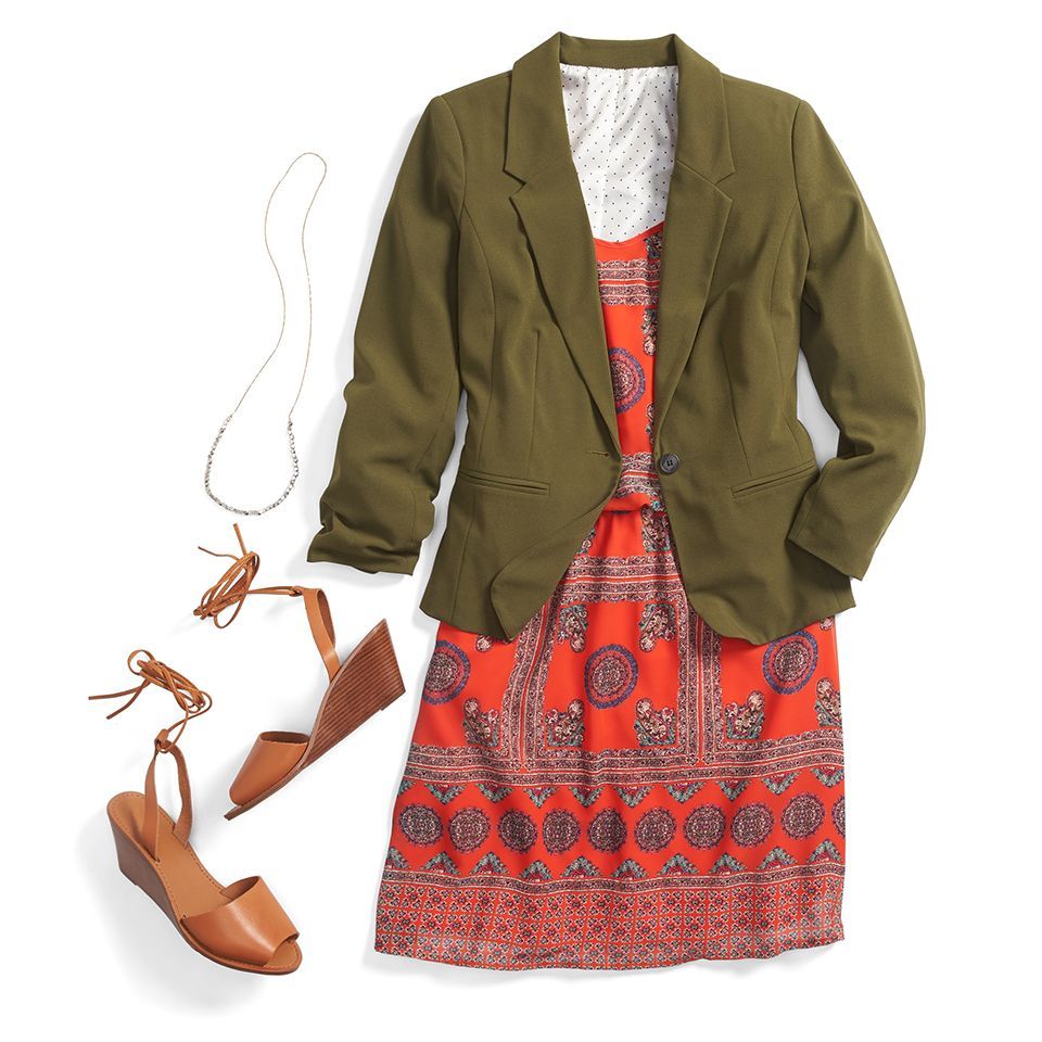 An olive green blazer adds instant polish to a colorful printed sundress. Keep your accessories simple with a long beaded necklace