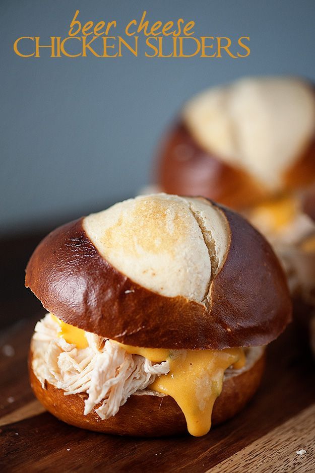 Beer Cheese Chicken Sliders – crockpot pulled chicken cooked in beer and topped with a beer cheese sauce!