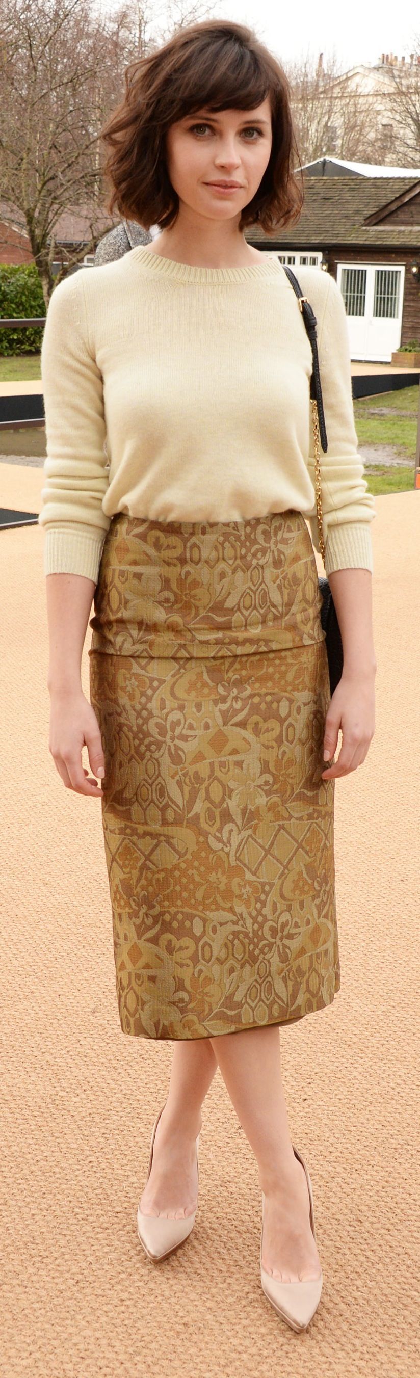 British actress Felicity Jones wearing Burberry at the Burberry Prorsum Womenswear A/W14 Show in London