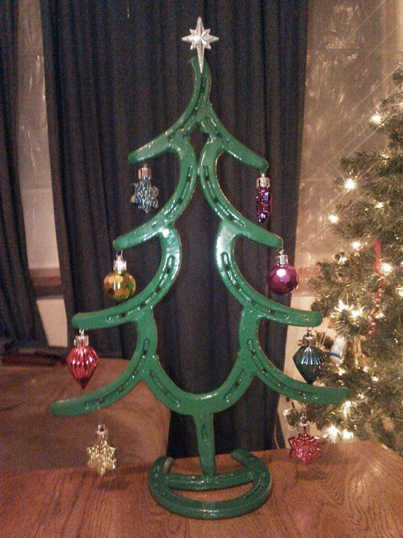 Christmas tree made from Horse Shoes by LawsonsMetalCreation  www.facebook.com/…