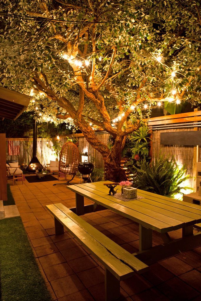Garden lights aglow. The couple has designed the yard for entertaining. But at a certain point in the evening, it seemingly