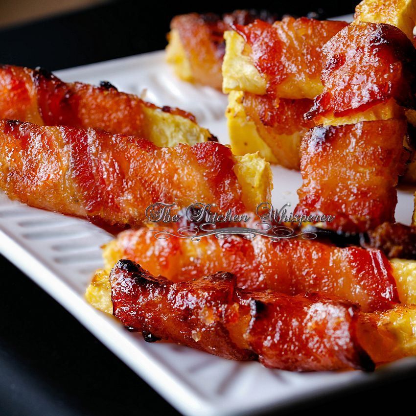 Grilled Sriracha Candied Bacon Wrapped Pineapple — ooh my…I have some family members who would go CRAZY over these!