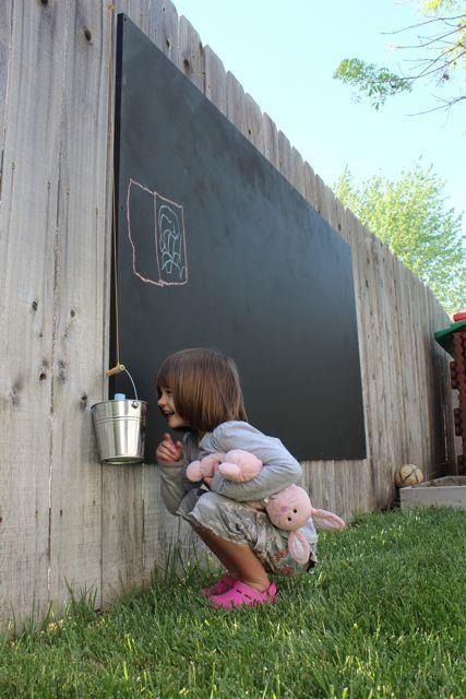 I like the idea of an outdoor chalkboard so kids can color without being out front of the driveway or blocking the patio when