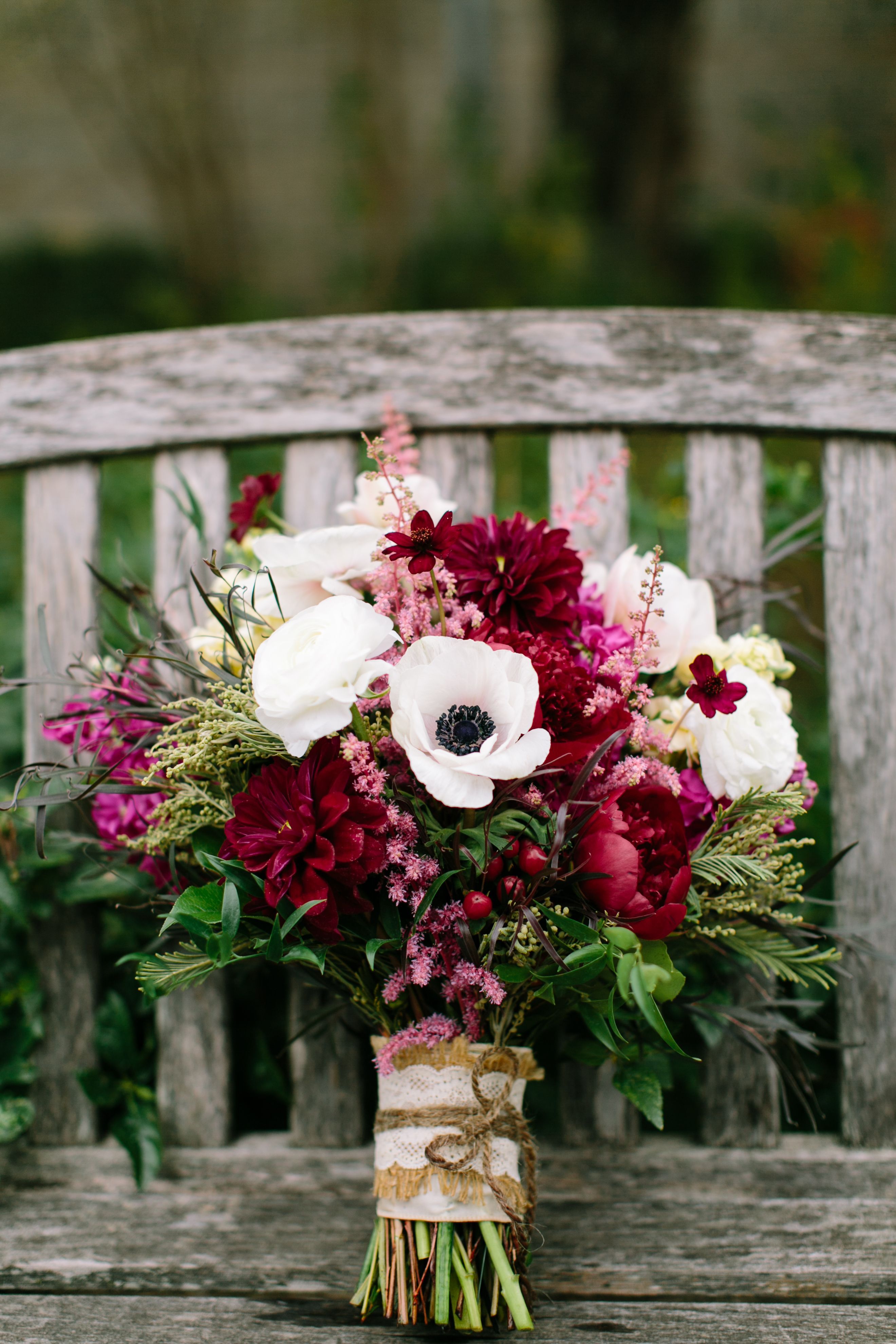 i loved my bouquet!! wine colored peonies, anemones for pops of white, and greenery. it was a wildflower textured bouquet for fall
