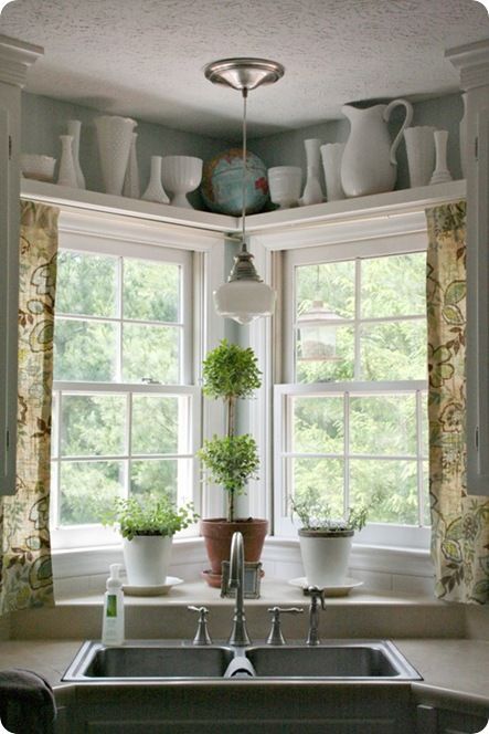 I really like this window area. Could you do something like this with the shelves on top and curtains? You wouldn’t even need to