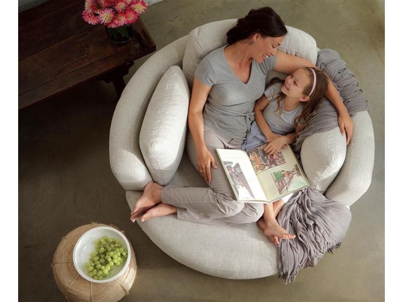 it’s called a Snuggle Chair. AND it swivels. *its called amazing and I want it*