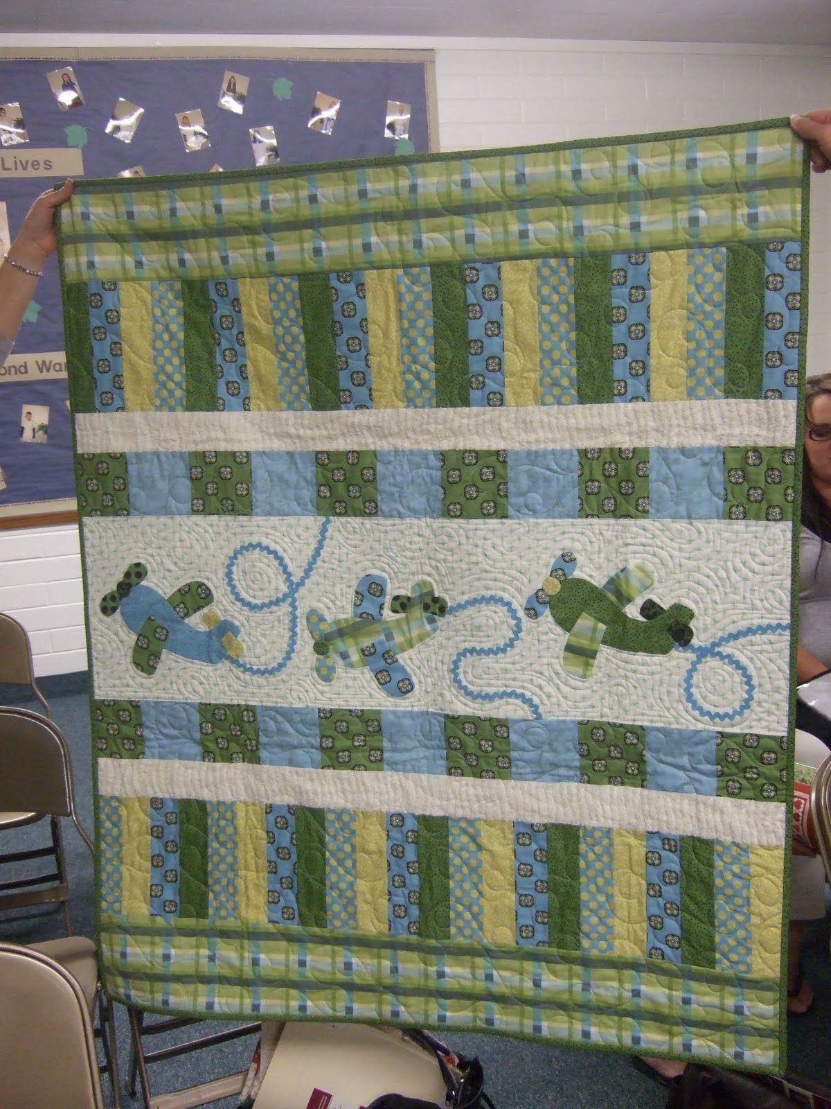 Jina Barney Designz shows this quilt from a show and tell that she attended on her blog. I don’t know the designer or the maker,