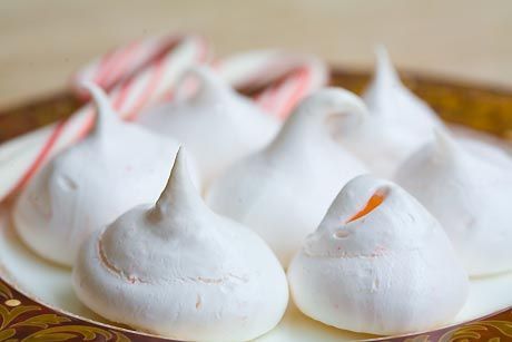 Light and airy peppermint meringue cookies, made with egg whites, sugar, crushed candy peppermints, and optional chocolate chips.