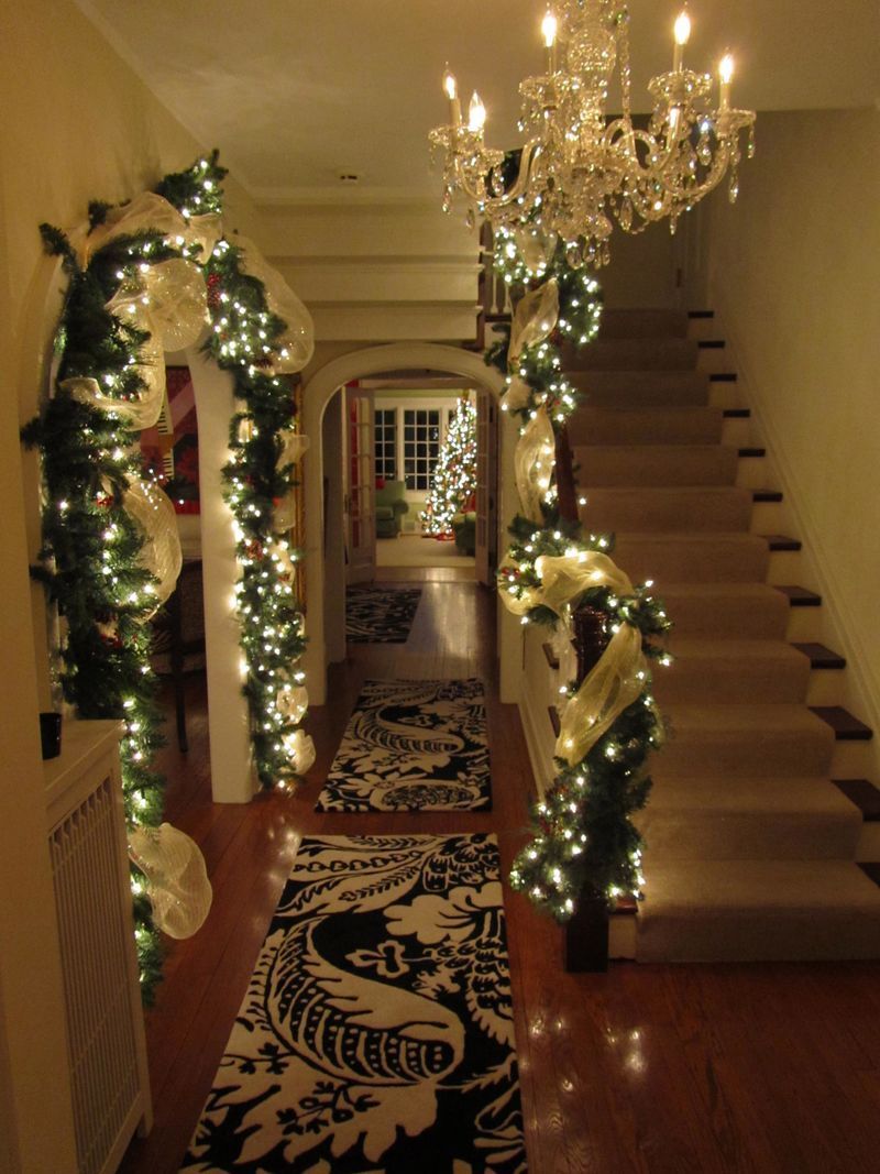 One day I will have slowly bought up enough garland at the after Christmas sales to be able to do my arches…. One day!