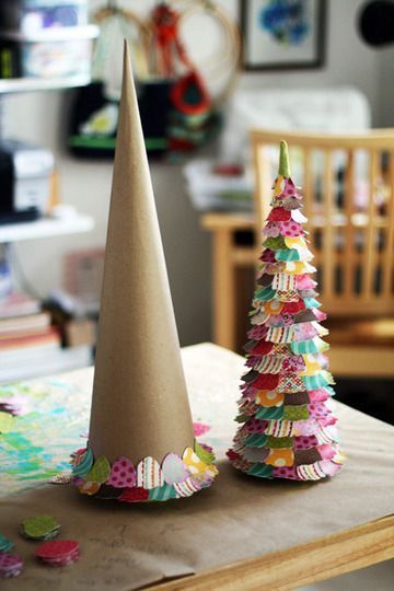 Paper craft Christmas trees. I was thinking of looking for marked down witches hats after Halloween or those birthday cone shaped
