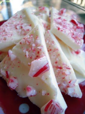 Peppermint Bark  2 packages white chocolate chips  1/2 tsp peppermint extract or several drops of peppermint oil  crushed candy