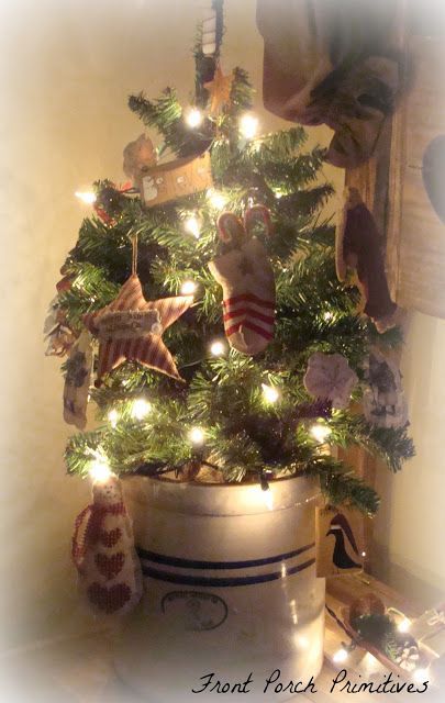 Prim Christmas Tree…in an old crock.