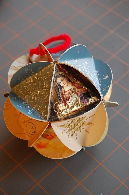 recycling too! – tutorial on how to make a paper ball ornament made from old xmas cards.  NOTE — you can add family photos (cut