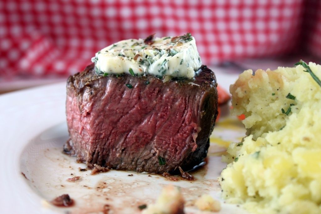 {restaurant style filet mignon with herb butter} sear the filets with 1/2 a stick of butter in a screaming hot skillet + finish