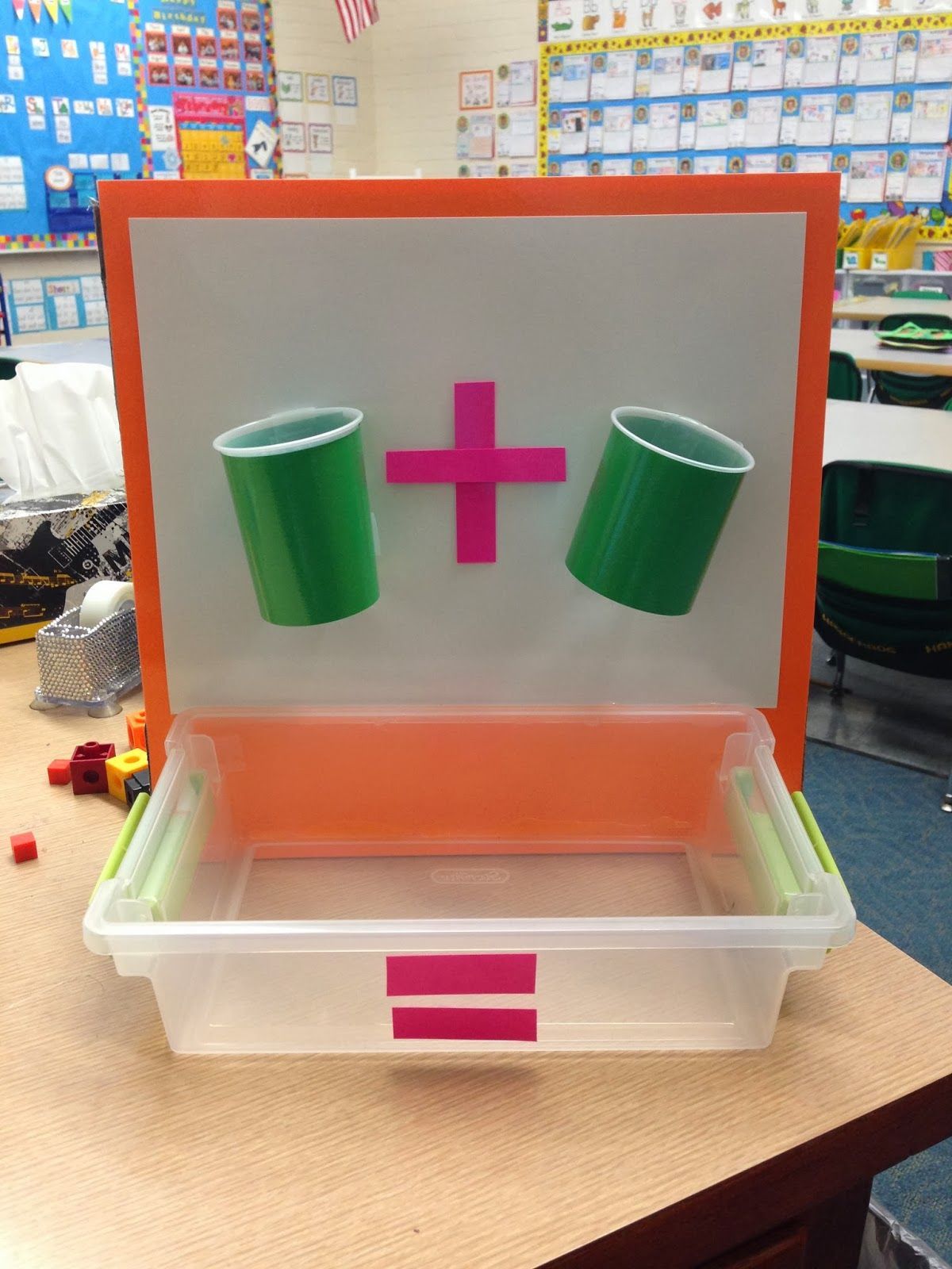 Sweet Sounds of Kindergarten : Math- Addition Cups! Cups have holes in them so that the manipulative a drop through. The kids use
