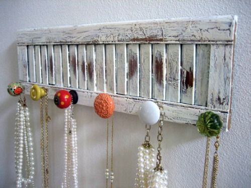 This is a great idea to add some cool knobs to shutters and turn it into a rack for jewelry, belts, etc…actually…the door
