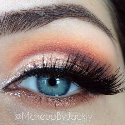 This look blends an assortment of orange and golds for a brightened smokey eye. This is the perfect palette for a stunning autumn