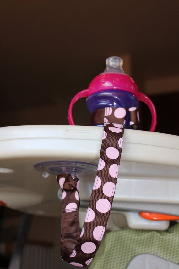 This sippy-cup leash keeps it from tumbling to the ground. | 36 Ingenious Things You’ll Want As A New Parent