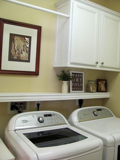 traditional laundry room–nice set up for a small laundry room  Put a cabinet in and remove my shelf! Look out yawed sales! I’m