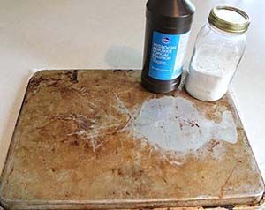Use hydrogen peroxide and baking soda to clean your old cookie sheets. NO scrubbing!