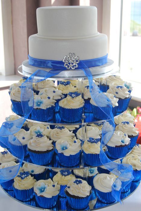 Wedding Cupcakes | Cupcake Wedding Cakes. LOVE THIS IDEA WITH THE COLORED WRAPPERS!!