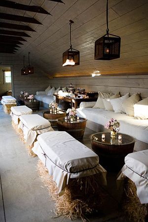 wow…cute for a cocktail hour idea??barrel tables and hay seating..great for an earthy/country wedding