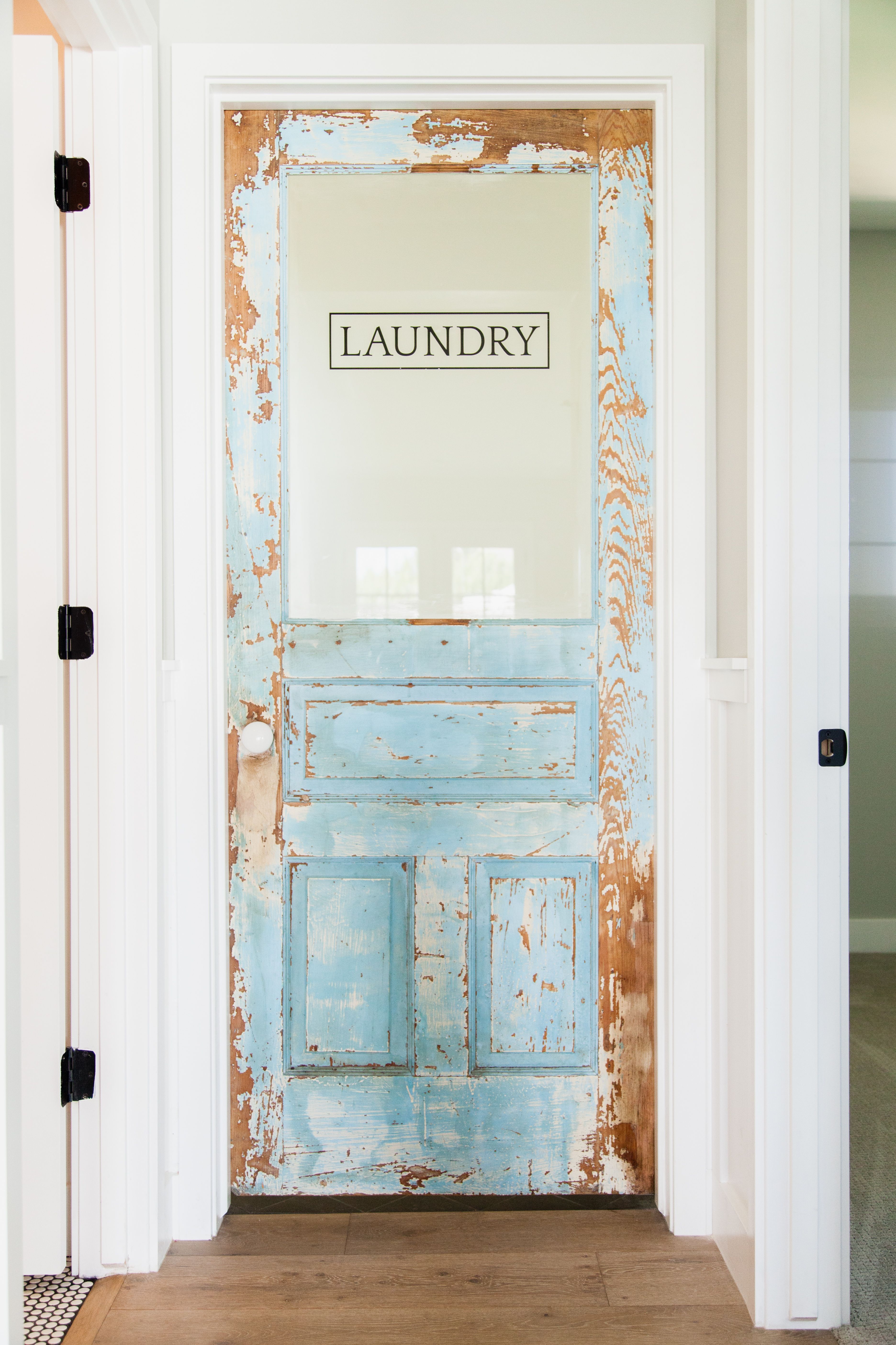 Custom laundry door with original vintage paint – by Rafterhouse.