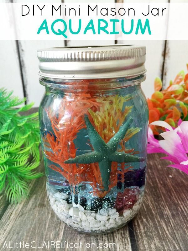 DIY Mini Mason Jar Aquariums are perfect for ocean themed parties or beach weddings.  Such a fun craft for kids too!
