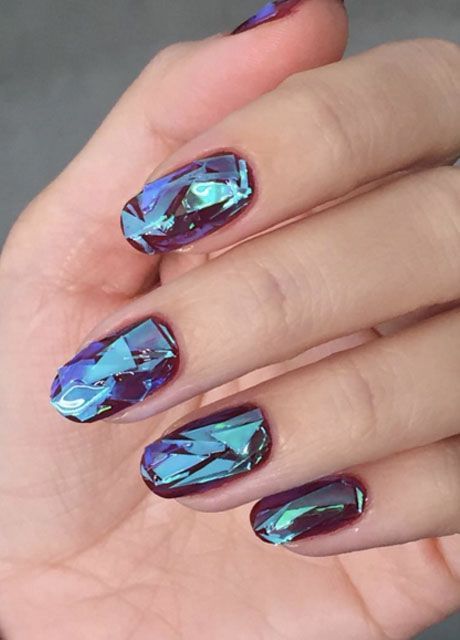 The latest trend in nail art is here — and it’s about to shatter your world