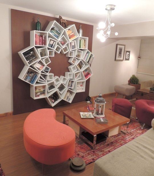 Use multiple items to make a different kind of book shelf. | 29 Impossibly Creative Ways To Completely Transform Your Walls