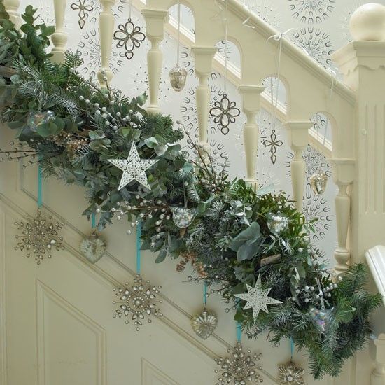 What a different way to hang garland on the stairs!  I prefer a more traditional greenery, but I think it’s interesting how it is