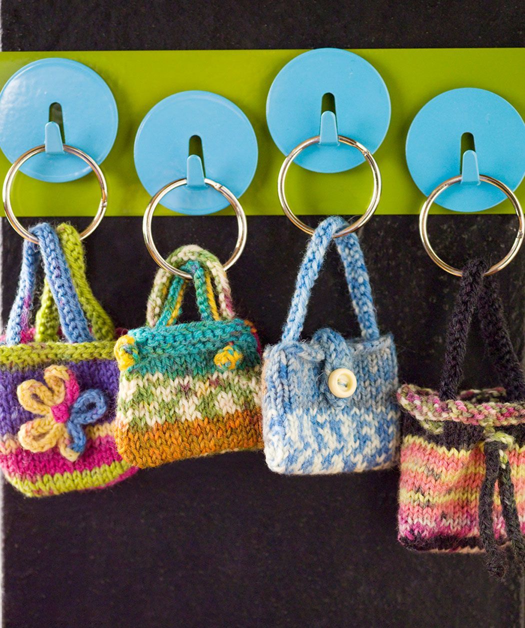 These mini knit keyring purses are awfully cute. Just make sure to knit them in