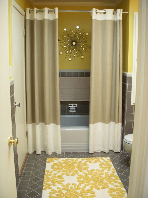 Two shower curtains. Changes the whole feel of a bathroom. Brilliant.