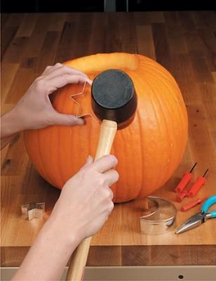 MUST REMEMBER THIS: carve a pumpkin using cookie cutters! I guess this explains