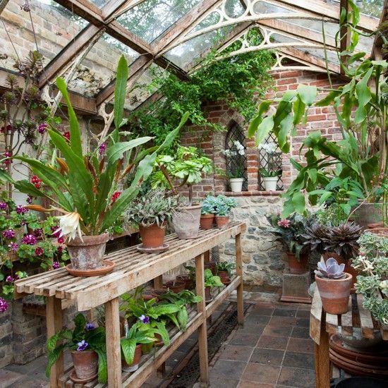 classic garden greenhouse | victorian greenhouse with a striking wood-and-metal