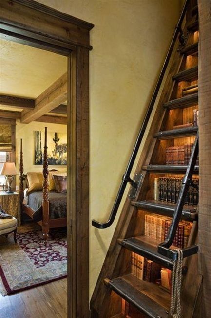 Books under the stairs.