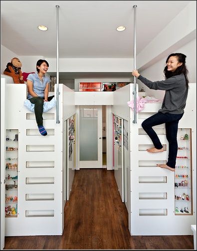 Lofted beds with walk-in closet underneath.This is by far the coolest thing ever