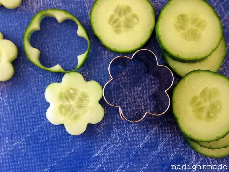 How use a cookie cutter to make cucumber flowers.