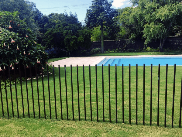 Top 50 Best Pool Fence Ideas - Exterior Enclosure Designs -   11 garden design Pool fence ideas