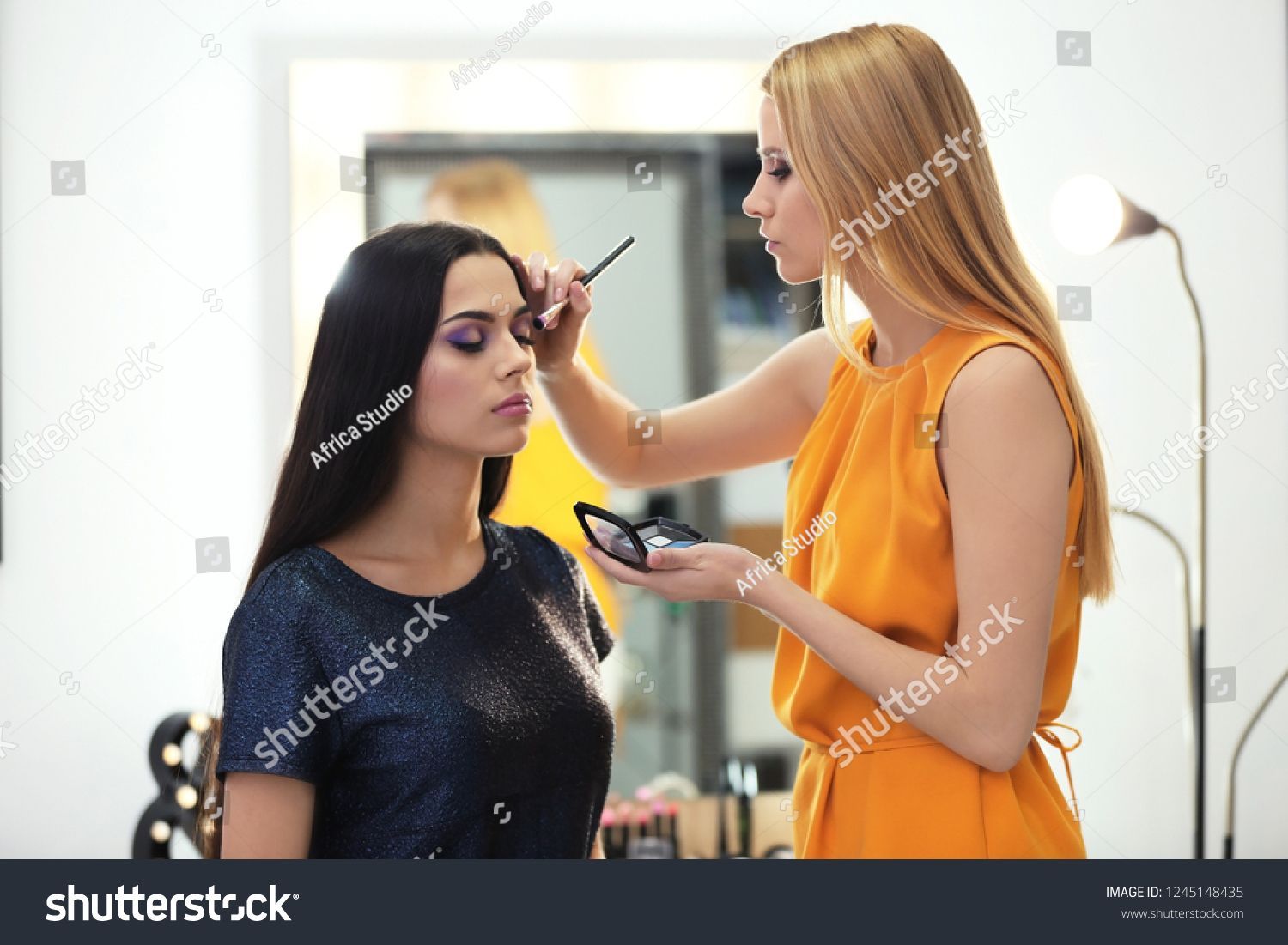 Professional Makeup Artist Working Young Model Stock Photo (Edit Now) 1245148435 -   9 makeup Artist working ideas