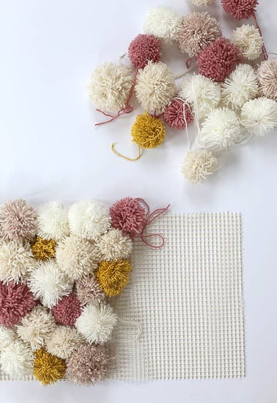 45 Perfectly Puffy Pom Pom Crafts | The Heathered Nest -   18 diy projects Cute pom poms ideas